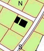 Lageplan eines Grundstücks mit zwei schwarzen rechteckigen Gebäudeflächen neben Straßen