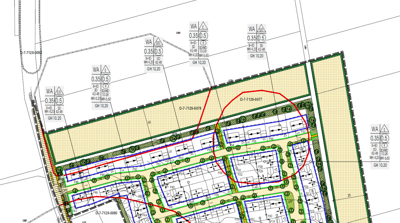 Lageplan eines Baugrundstücks mit Wegen, Grünflächen und Gebäudefeldern.
