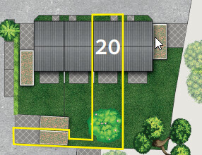 Luftbild eines Grundstücks mit Haus, Dach und Grünfläche, gelber Umrissmarkierung