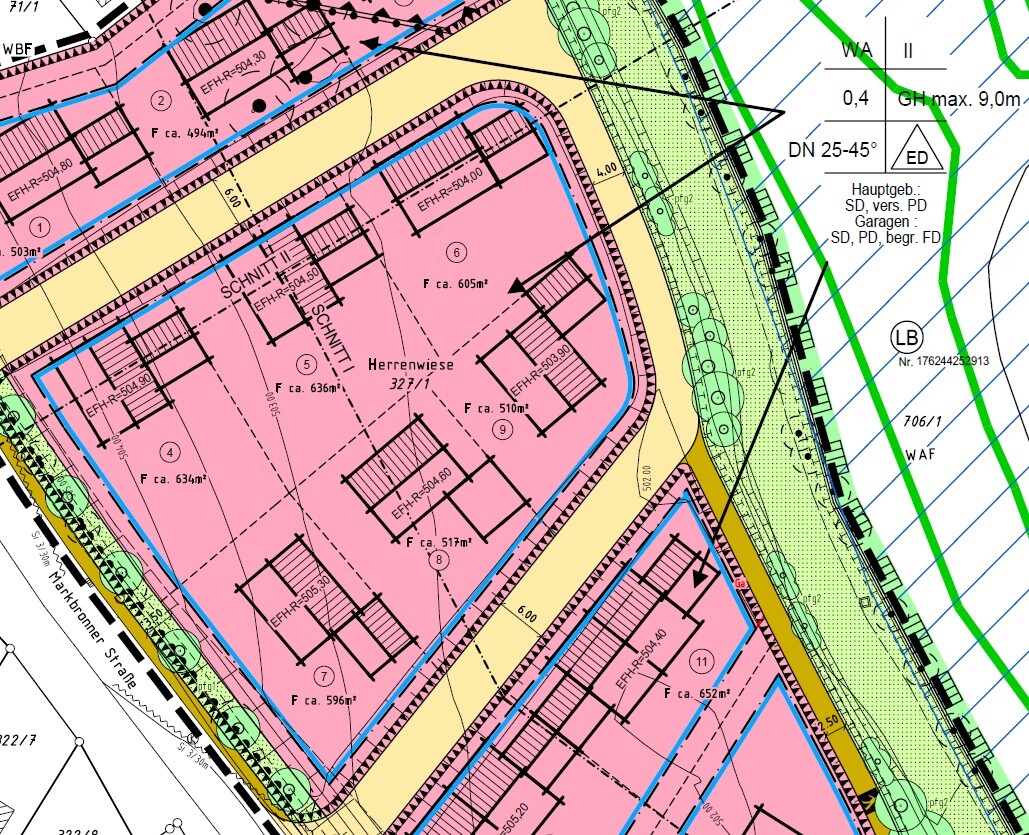 Detailreicher Bebauungsplan mit Gebäudeflächen, Straßen, Grünzonen und Wasserläufen.