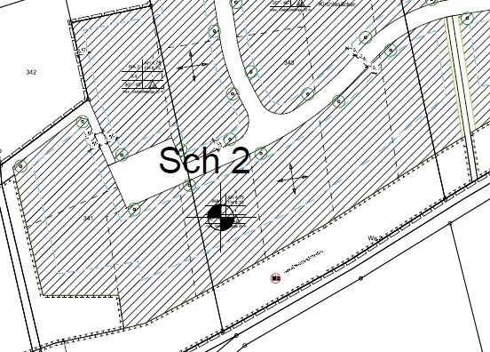 Lageplan mit parzelliertem Gebiet, Straßen, Bäumen und großem Text Seh 2.