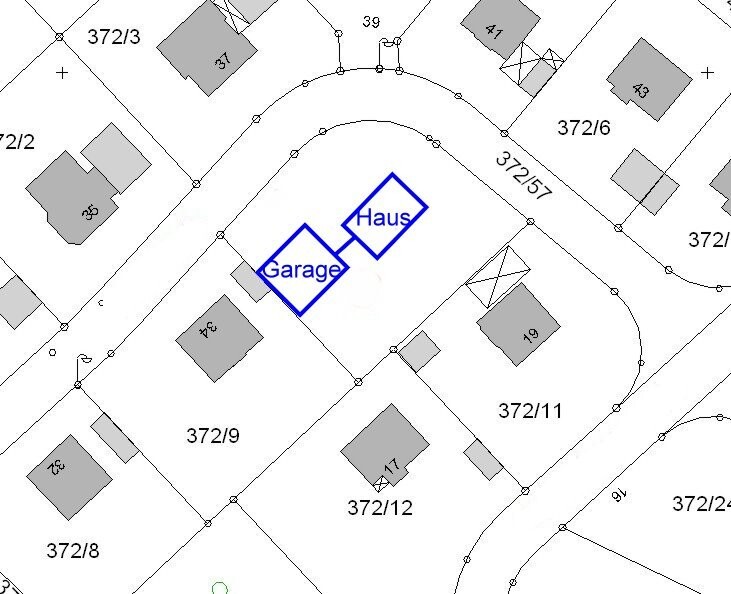 Lageplan eines Baugrundstücks mit markiertem Haus und Garage