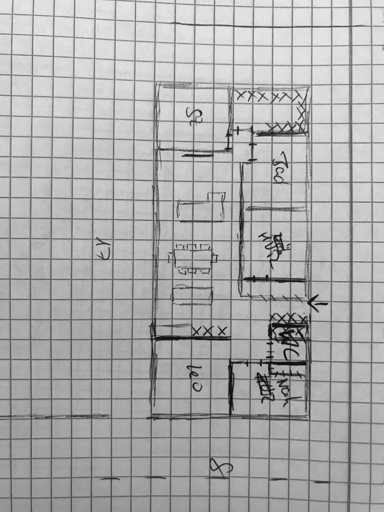Handgezeichneter Grundriss eines Wohnraums mit Zimmern, Wänden und Türen auf kariertem Papier.