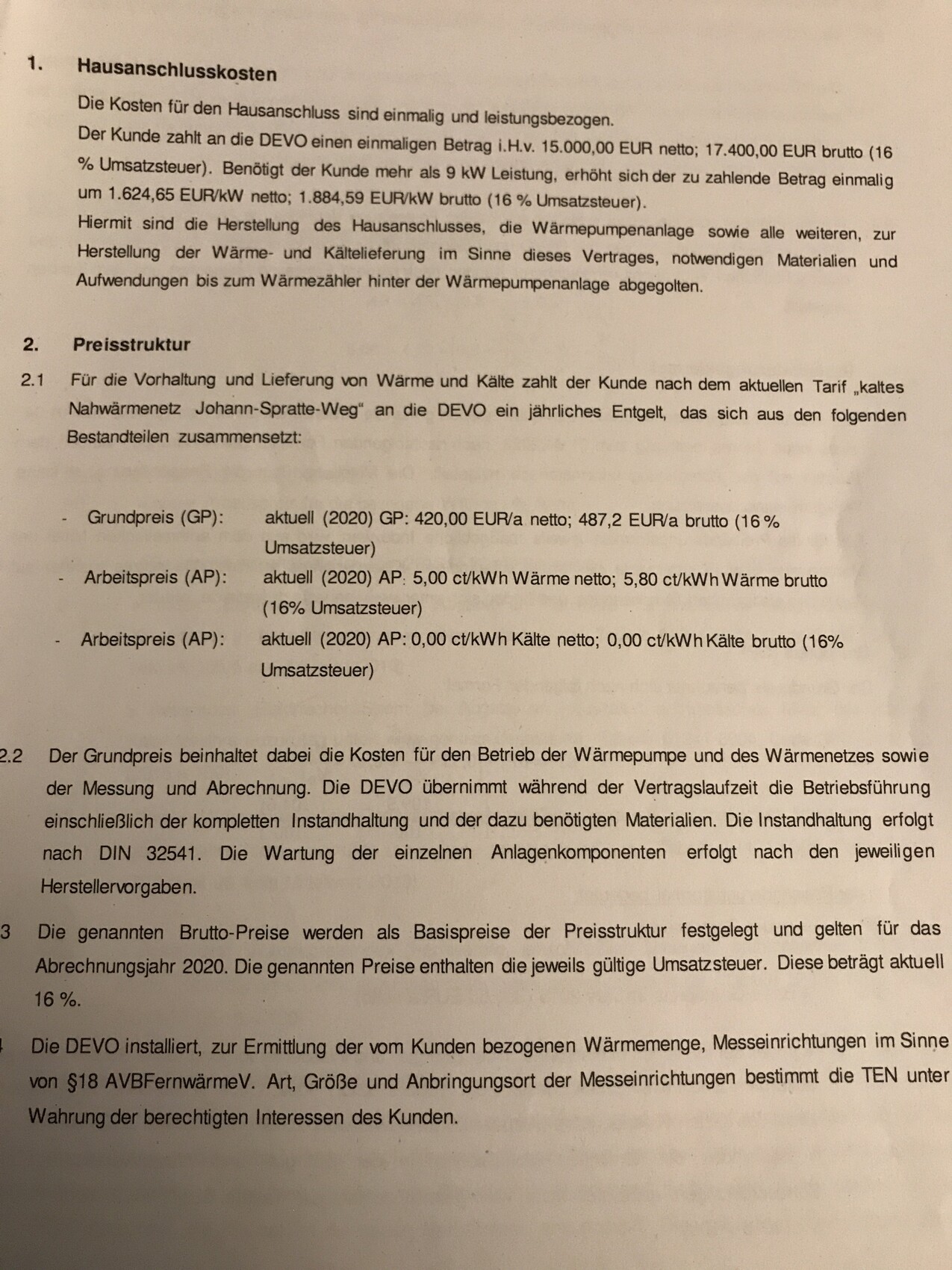 Seite eines Vertragsdokuments über Hausanschlusskosten und Preisstruktur für Wärme.