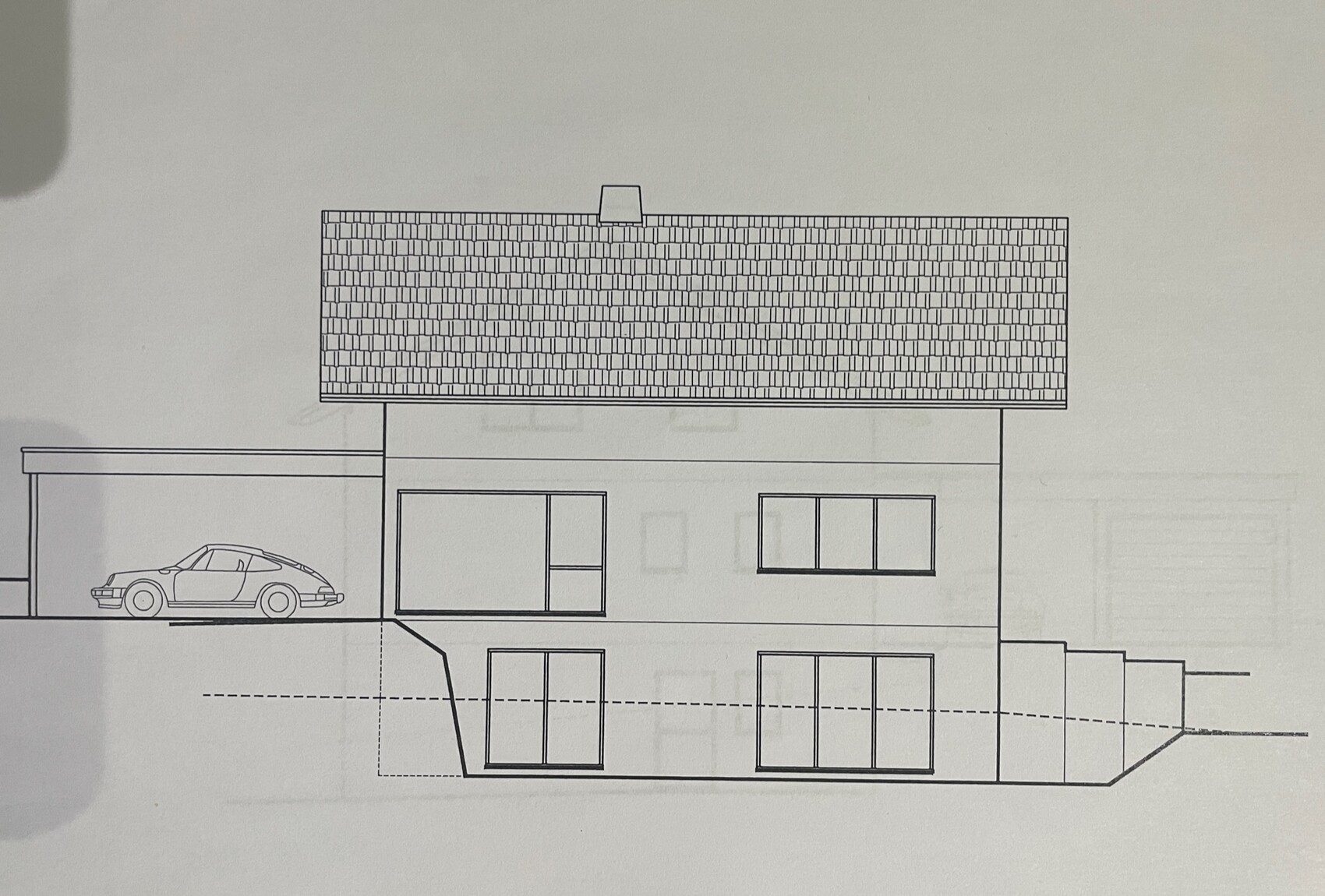 Architekturzeichnung eines zweistöckigen Hauses mit Satteldach, Carport und Treppen.