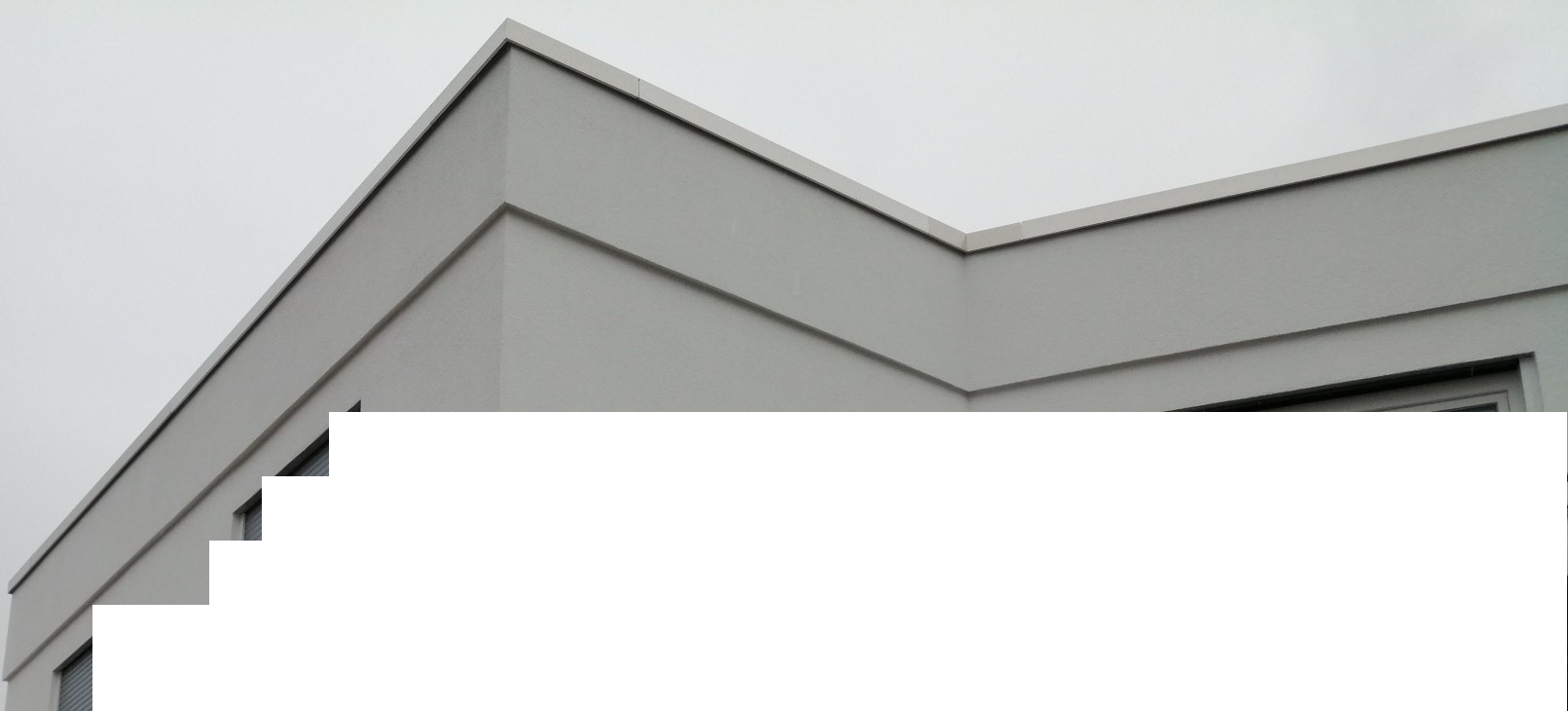 hausansichten-modernes-gebaeude-aussenansicht-dachkante.png