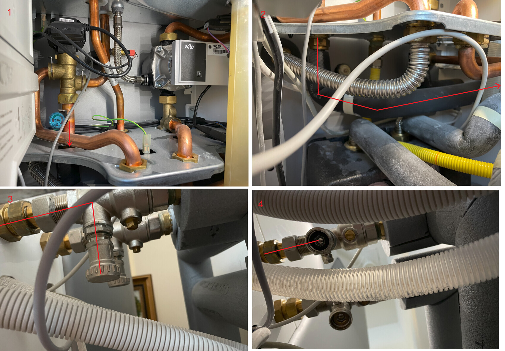 Heizungsinstallation mit Kupferrohren, Wilo-Pumpe, Ventilen und Kabeln im Gehäuse.