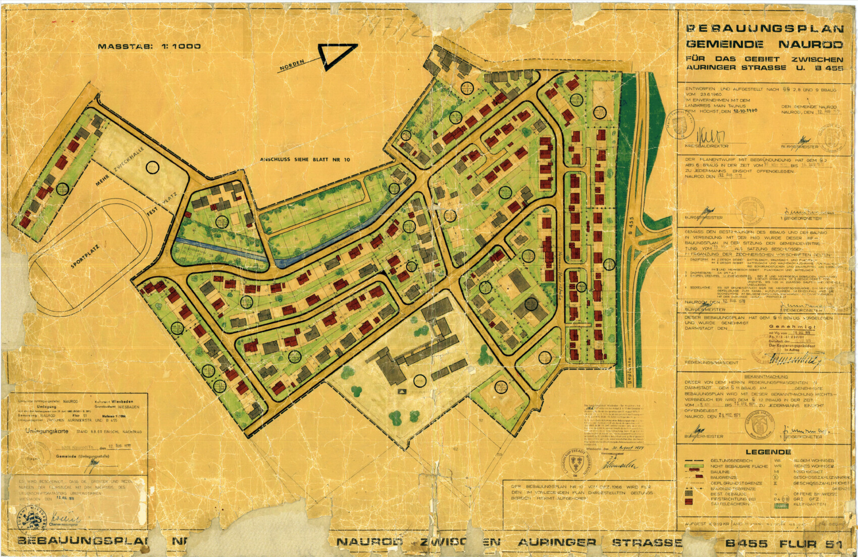 Historischer Bebauungsplan einer Gemeinde mit Straßennetz, Häusern, Grünflächen und Sportanlagen.