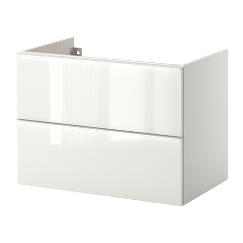Weißer, moderner Wandschrank mit zwei grifflosen Schubladen.