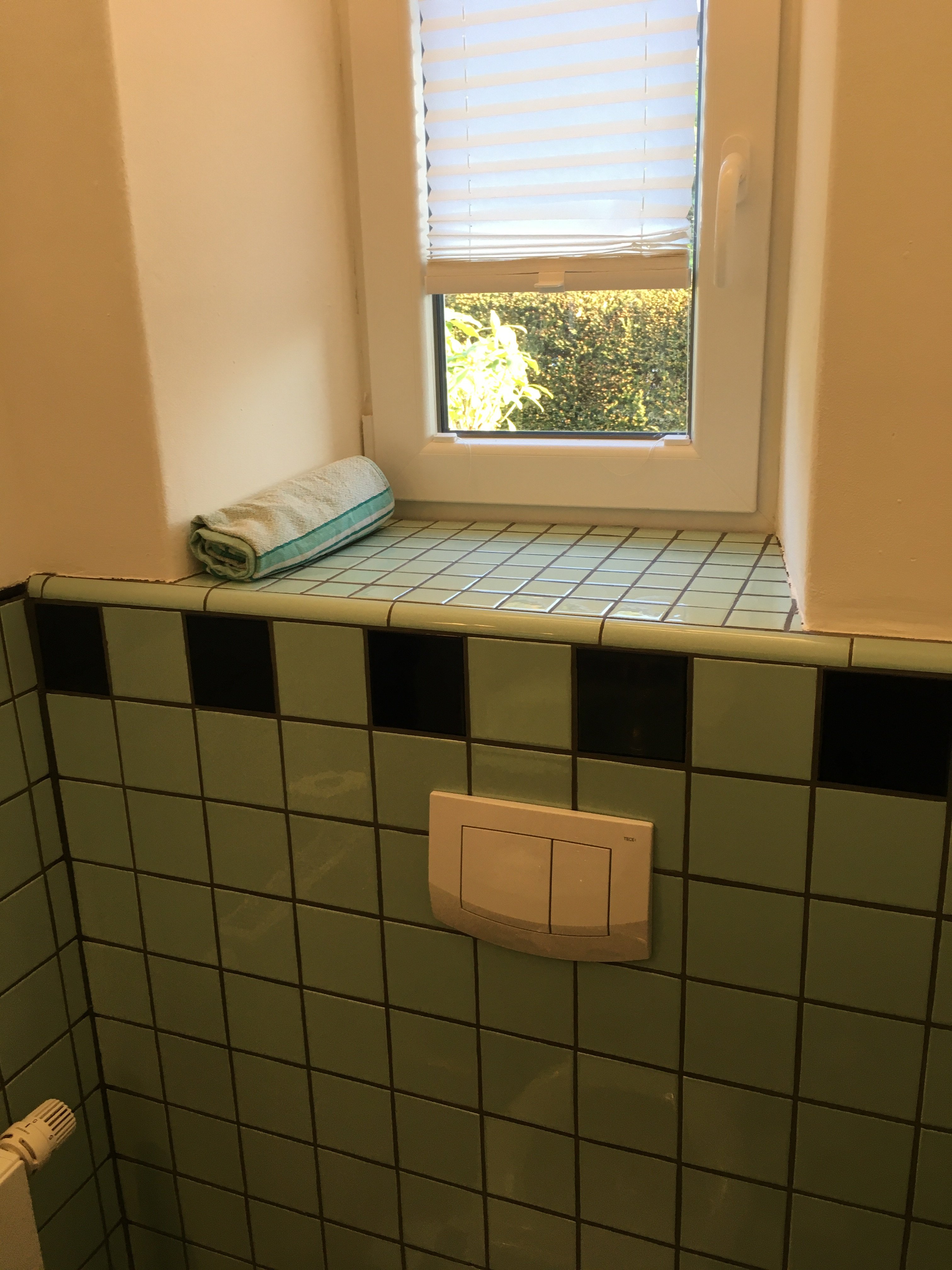 hoehe-gefliester-waende-in-badezimmer-12m-oder-15m-397723-1.jpeg