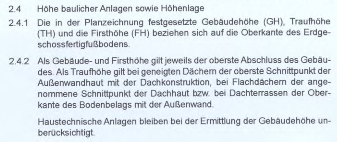 Textabschnitt über Gebäudehöhe, Traufhöhe und Firsthöhe aus Planzeichnung.
