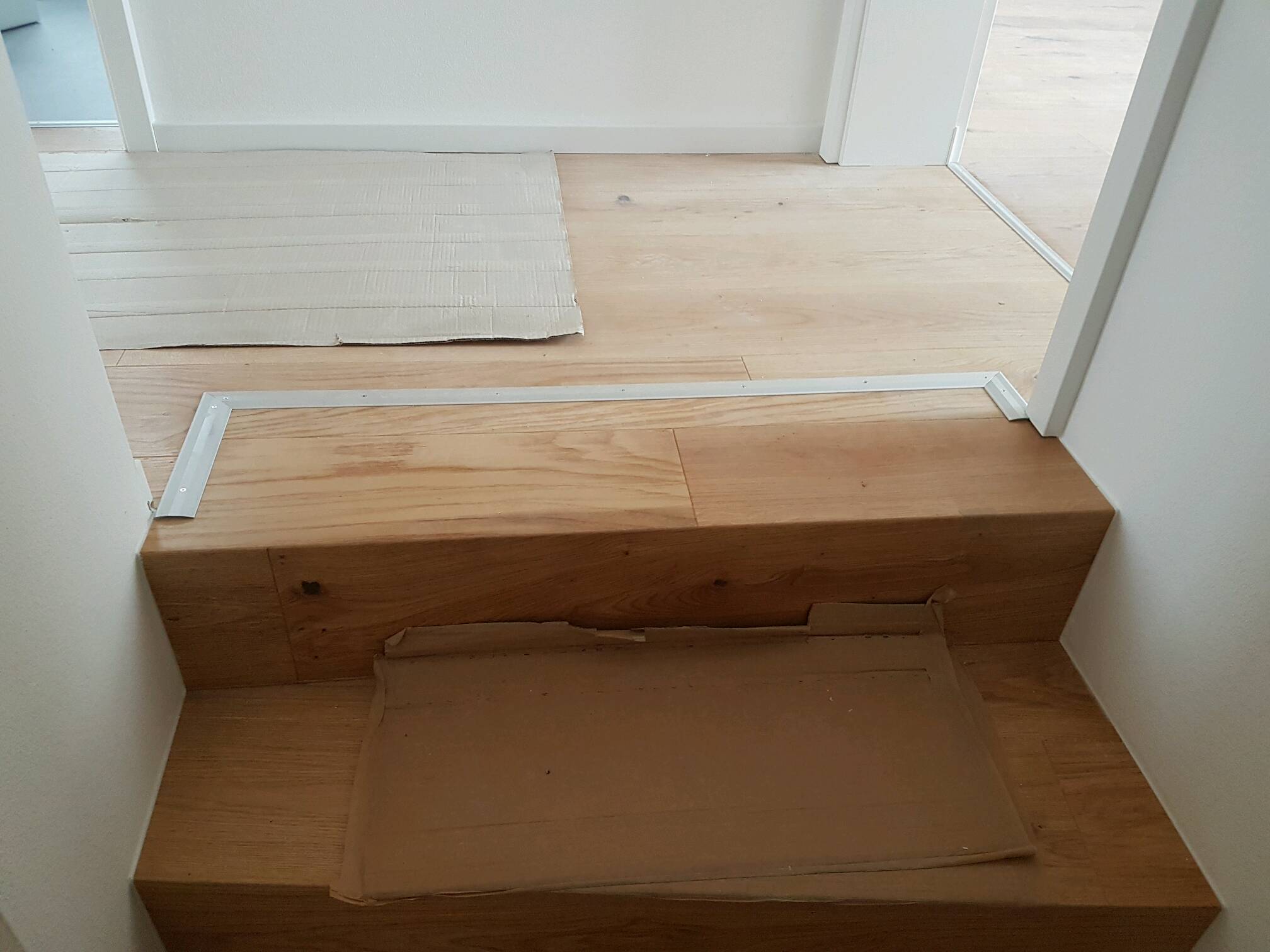 holzstufen-treppenverlegung-parkettboden-neu.jpg
