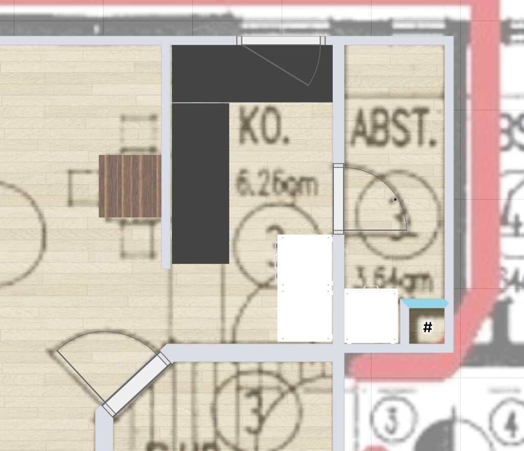 Grundriss eines Wohnbereichs mit Küche, Insel und Tisch in offener Raumgestaltung.