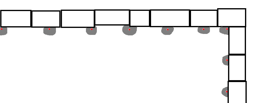 2D Küchengrundriss mit Wandzeile aus Schränken und Steckdosenmarkierungen