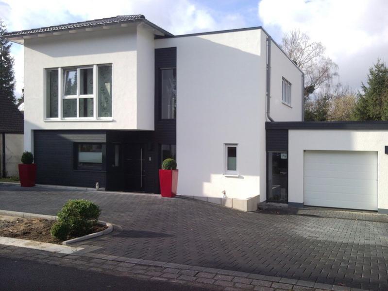 massivbau-mit-holzfassade-kfw70-56254-1.jpg