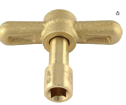 Messingfarbener T-Hebel mit hex-Socket am unteren Ende, Werkzeug.