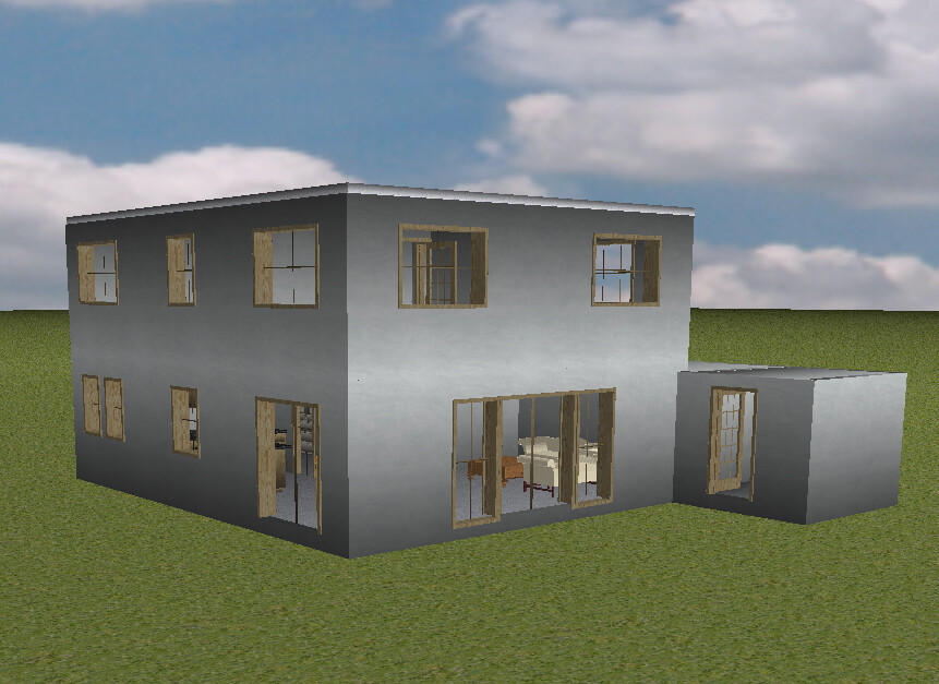 Zweistöckiges graues Haus mit vielen Fenstern steht auf Grasfläche; kleiner Anbau rechts.