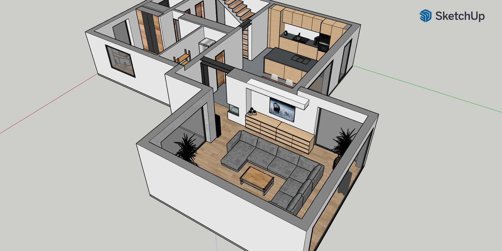 3D-Ansicht eines offenen Wohn- und Küchenbereichs mit grauem Ecksofa, TV und Treppe