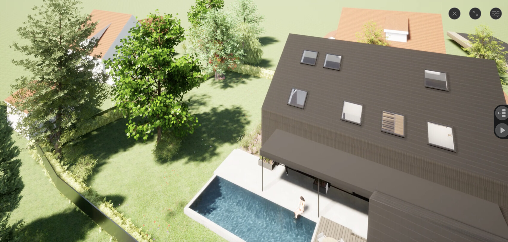 Vogelperspektive auf modernes Haus mit dunklem Dach, Pool, Terrasse und Person am Becken.