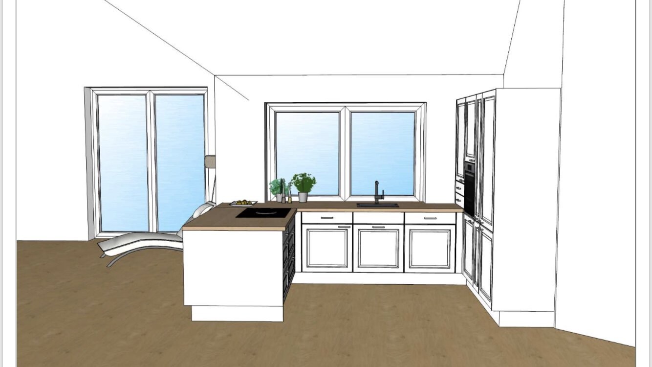 Küchenraum mit Insel, Kochfeld, Spüle und Backofen; Fenster über der Arbeitsplatte.