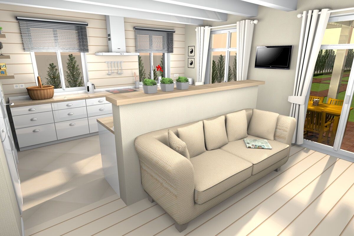 Heller offener Wohn- und Küchenbereich mit beige Sofa, Pflanzen und Balkonblick.