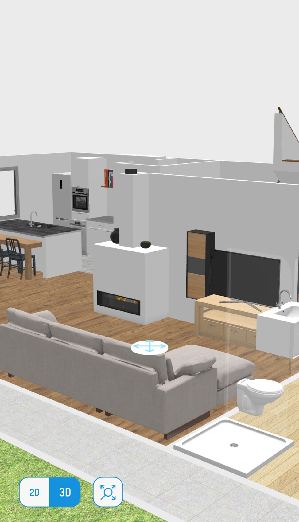 Offener Wohnbereich mit Sofa, Kamin, TV, Kücheninsel und Bad mit Dusche/Toilette.