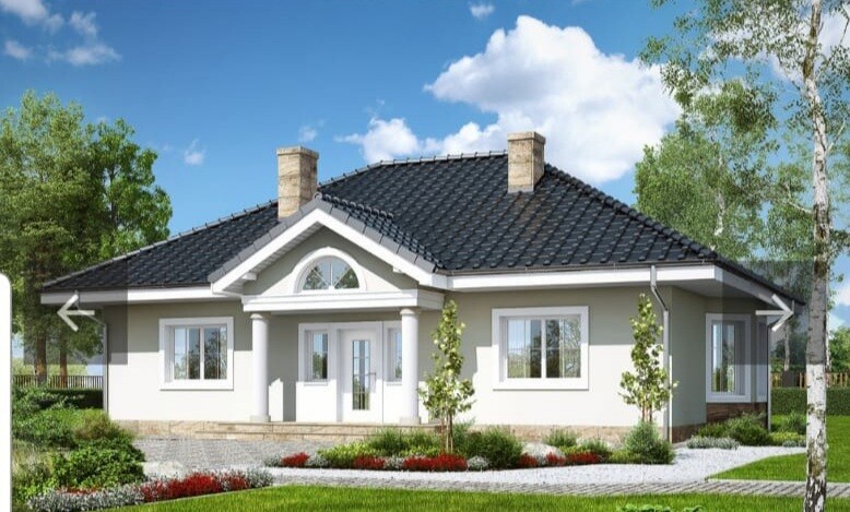 Einfamilienhaus mit dunklem Ziegeldach, Säulen-Portal, Rundbogenfenster und Garten.