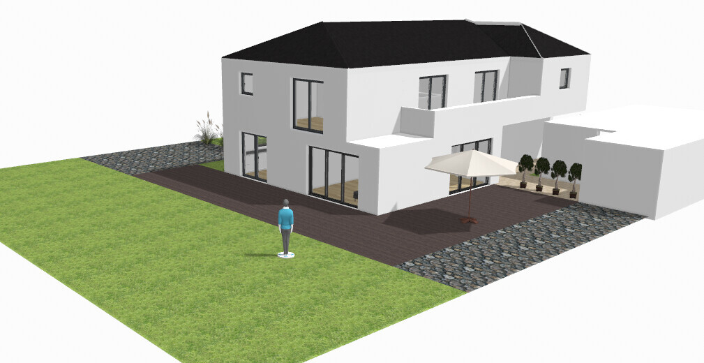 Moderne weiße zweistöckige Villa mit dunklem Dach, Terrasse, Garten und einer stehenden Person davor.