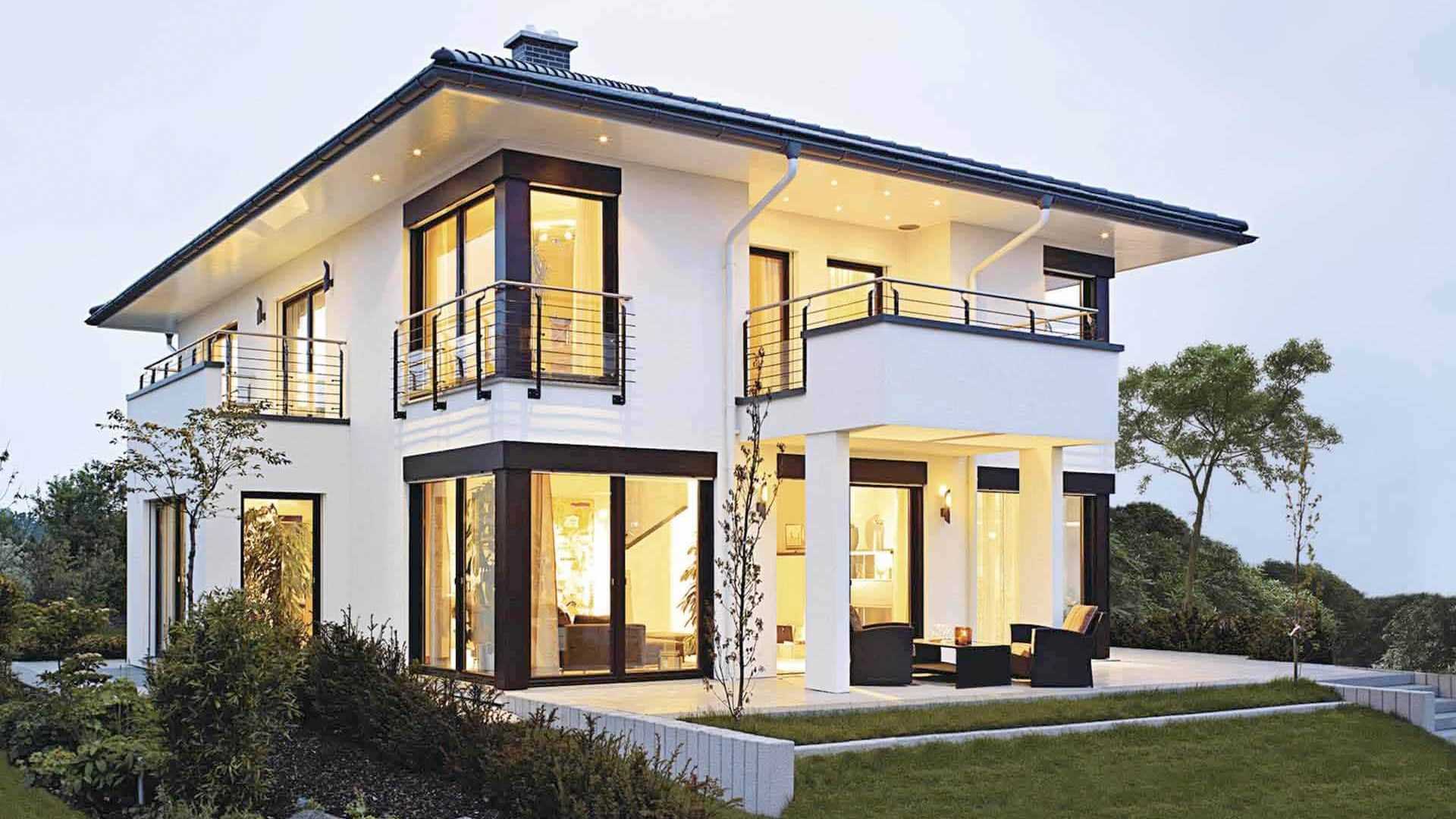 moderne-haus-aussenansicht-terrasse-glasfronten-beleuchtet.jpg
