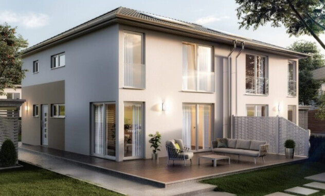 Modernes zweistöckiges Haus mit Terrasse, Gartenmöbeln und Sitzbereich.