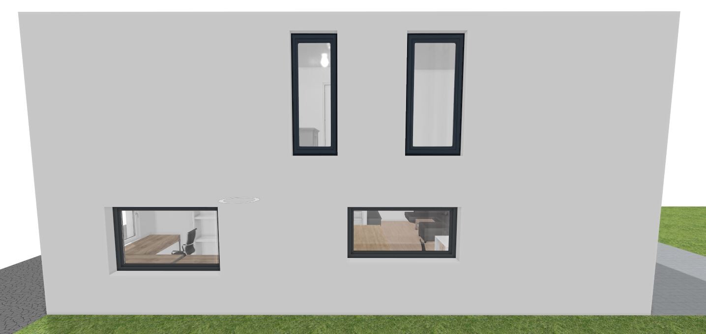 Graues Haus mit vier Fenstern: zwei hohe oben, zwei unten; Innen Büro und Essbereich sichtbar.