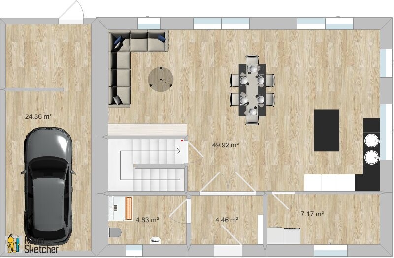 Grundriss: Garage mit Auto links, offener Wohn-/Essbereich rechts, Küche, Treppe Mitte.