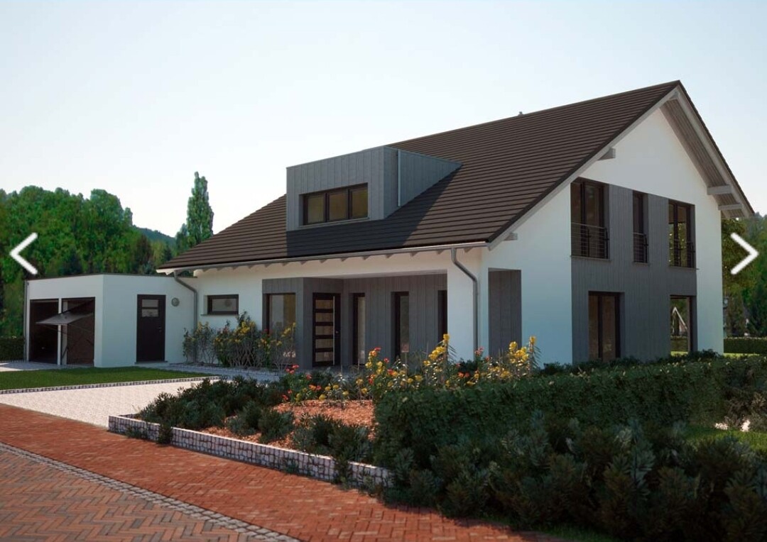 moderne-helle-aussenansicht-eines-hauses-mit-garten-und-einfahrt.jpg