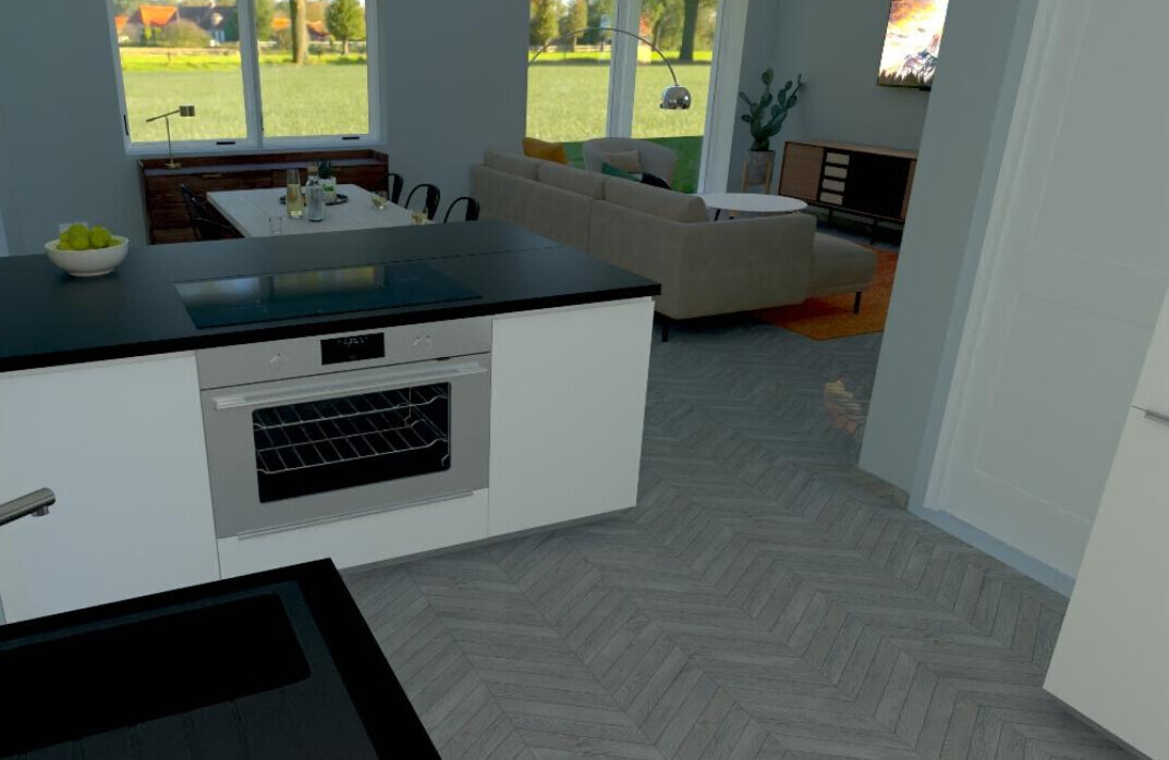 Offene Küche mit Insel, Ofen, Wohnzimmer mit Sofa, TV, Pflanzen und Blick ins Grüne.