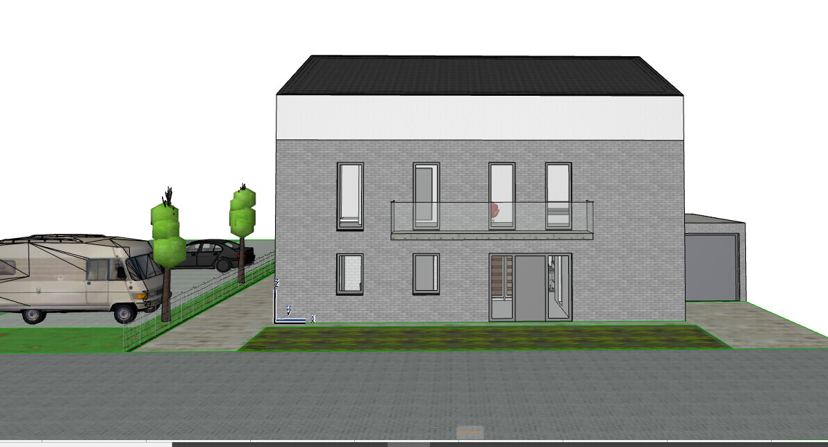 Zweistöckiges graues Backsteinhaus mit Balkon, Garage rechts, Wohnwagen links.