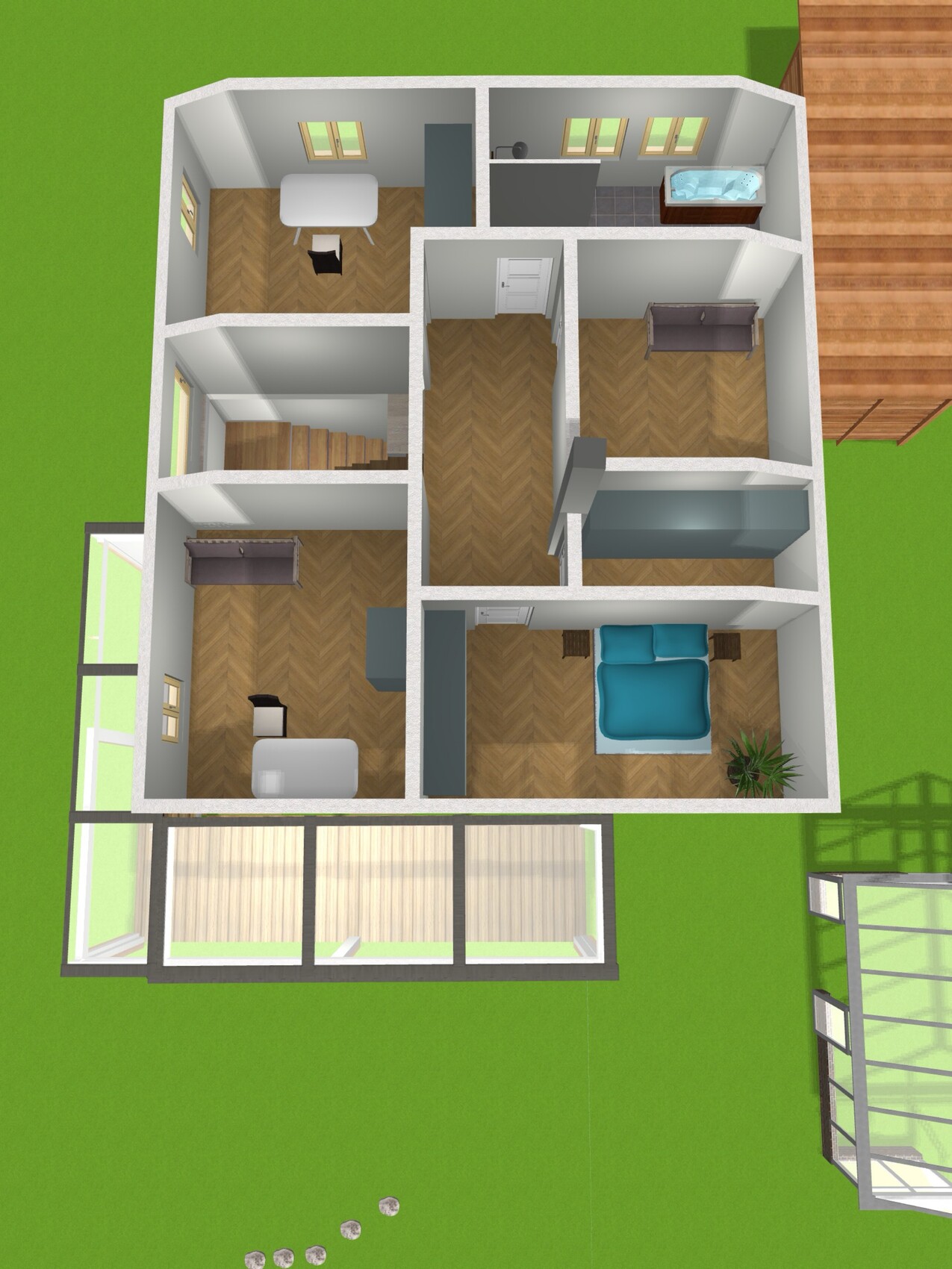 Grundriss eines Hauses: Flur, Schlafzimmer, Wohnzimmer, Küche, Bad und Terrasse.
