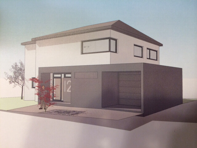 Moderne zweigeschossige Hausfront mit Garage und minimalistischer Architektur