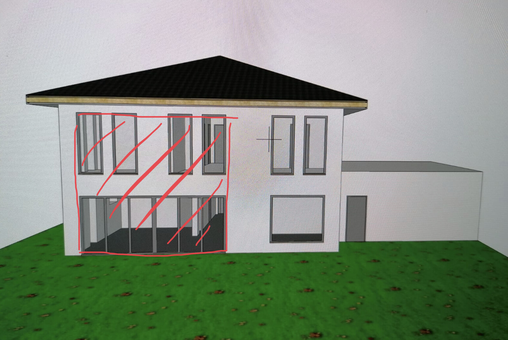 Modernes zweistöckiges Haus mit Glasveranda links, große Fensterfronten, grüner Rasen davor