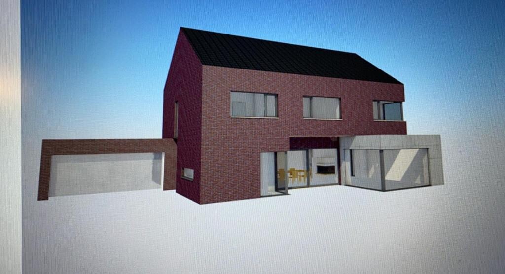 Moderne zweigeschossige Backsteinvilla mit rotem Mauerwerk, Glas-Anbau und Garage.