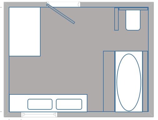 Grundriss eines kleinen Apartments: Schlafbereich links, Küchenzeile unten, Bad mit Badewanne rechts.
