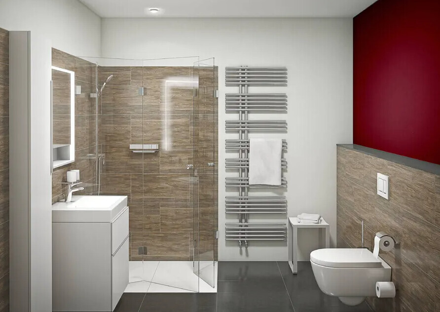 Moderne Badezimmeransicht: Glasdusche, Waschbecken, WC, Handtuchheizkörper, rote Akzentwand