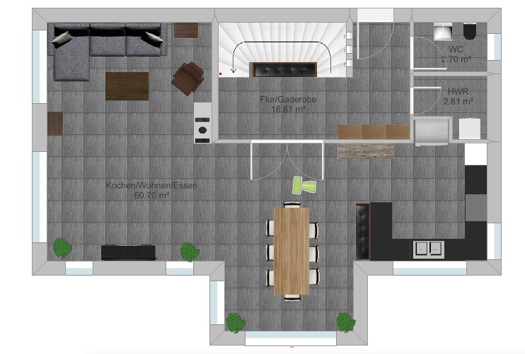Offener Grundriss Kochen/Wohnen/Essen mit Esstisch, Sofa, Kücheninsel, Treppe, WC, HWR.