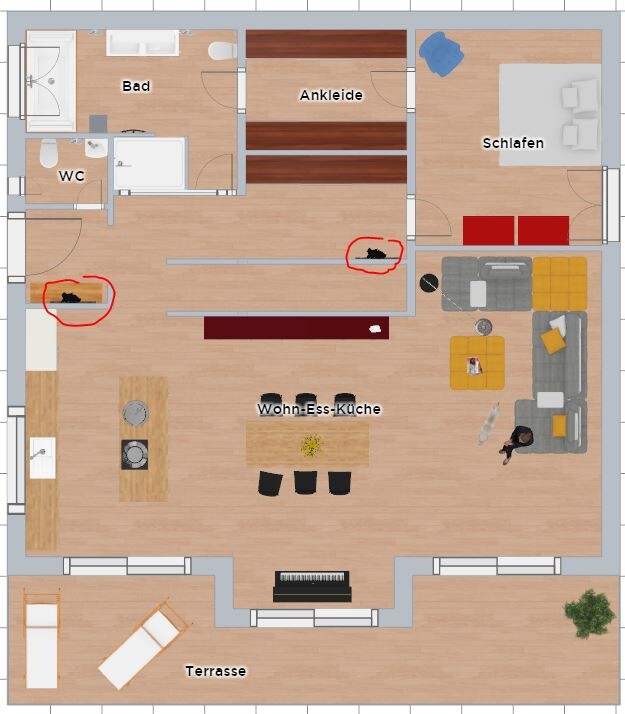 Grundriss einer Wohnung mit Terrasse: Wohn-Es-Küche, Schlafen, Bad; zwei schwarze Figuren markiert.