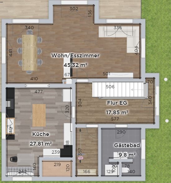 Grundriss eines Einfamilienhauses: Wohn-/Esszimmer, Küche, Flur EG, Gäste Bad, Außenbereich grün.