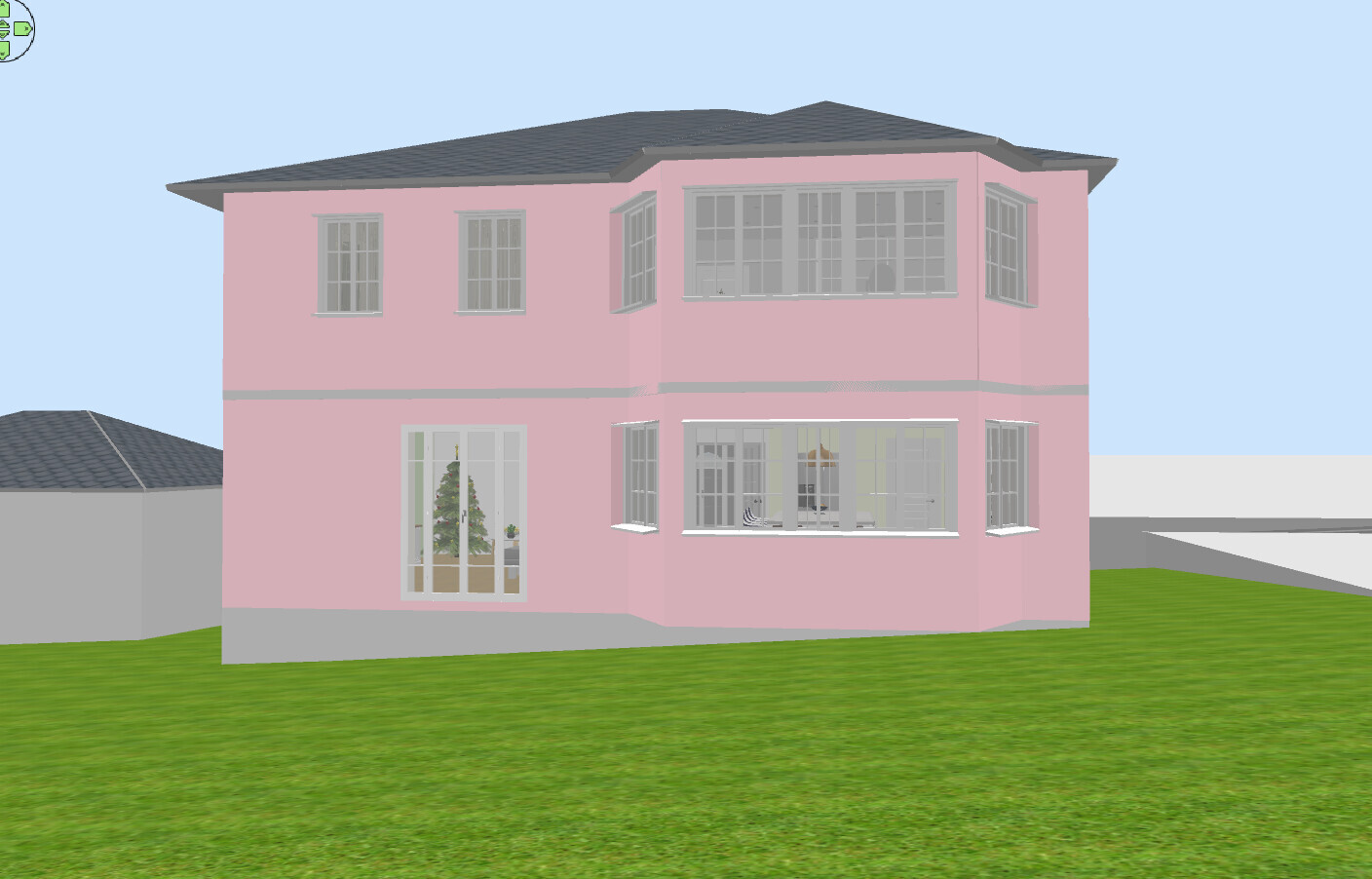 Zweistöckiges rosa Haus mit vielen Fenstern auf grünem Rasen, blauer Himmel.
