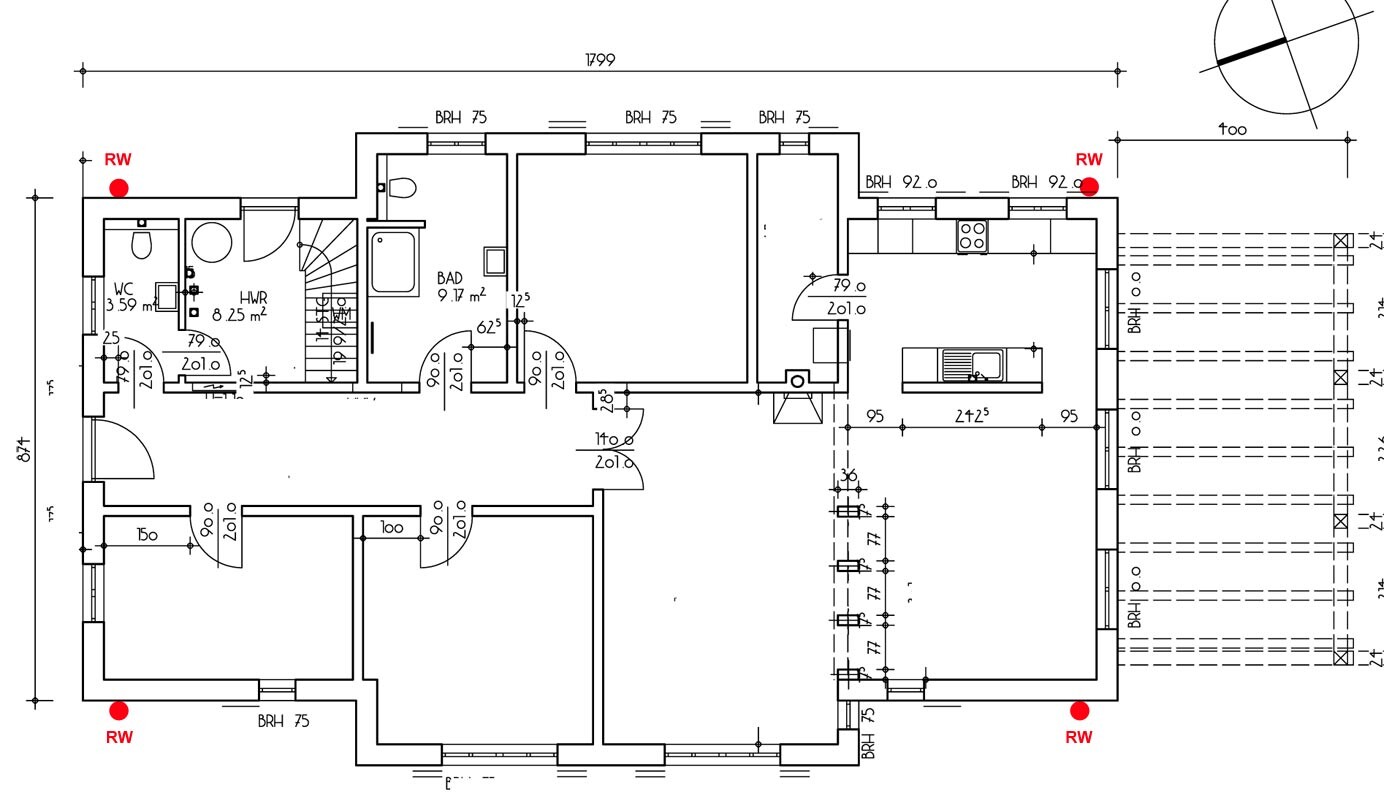 Grundrissplan eines Einfamilienhauses mit Küche, Bad, Fluren und Treppen