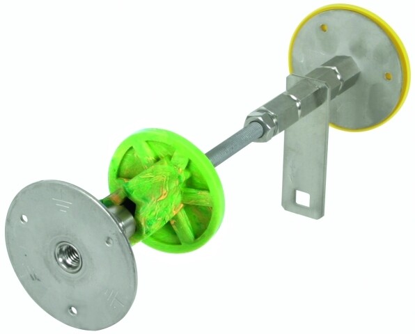 Mechanische Achse mit grünem Spulenteil zwischen zwei Metallplatten an Montagehalterung