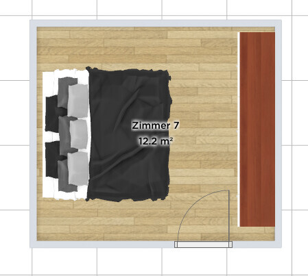 Aufsicht auf Schlafzimmer-Grundriss mit Bett, dunkler Decke, weißen Kissen und Holzboden