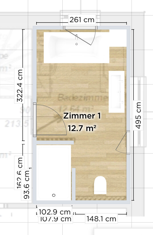 Grundriss von Zimmer 1 (12.7 m²) mit Holzboden, Tür, Fenster, Bett und WC.