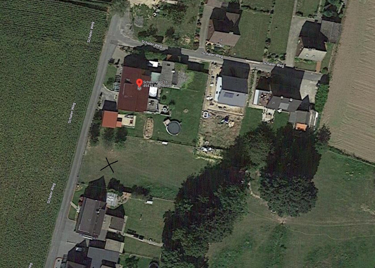 Luftbild einer Wohnsiedlung am Schaler Weg; roter Marker markiert Haus Nr.16 in Ibbenbüren.